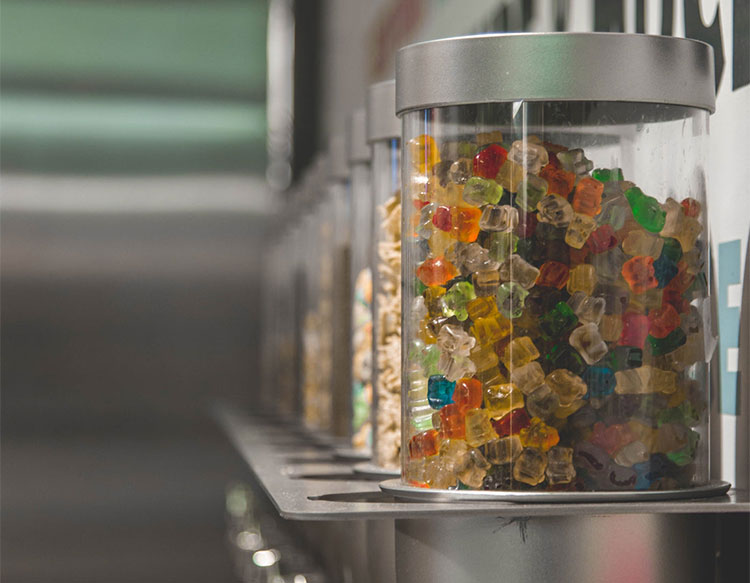 Gummy bear containers on shelf