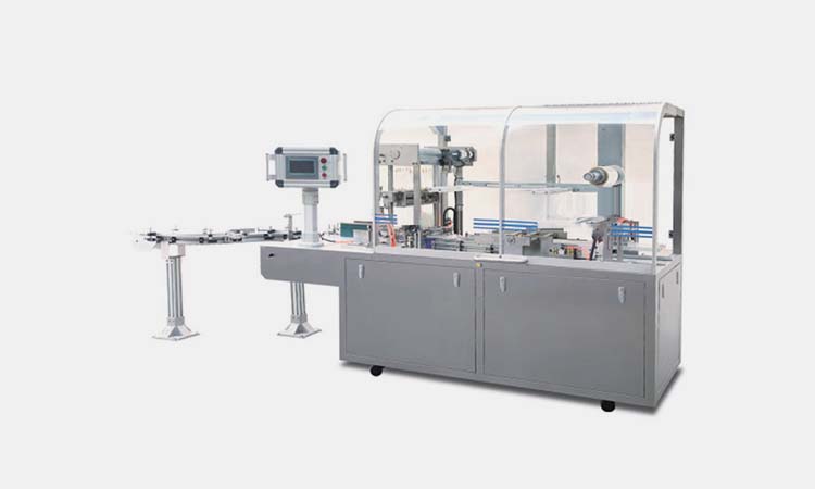 Flow wrapping machine